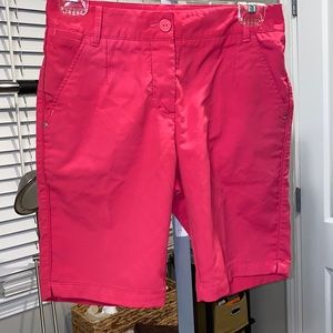 Puma bright pink Bermuda shorts, size 2, with button and zipper